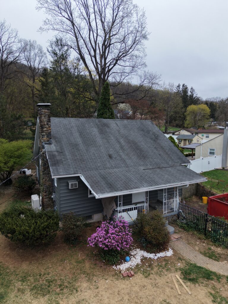 Before photo — single family roof replacement in Easton PA on Frost Hollow Rd showing original aging roof prior to replacement by Roofera