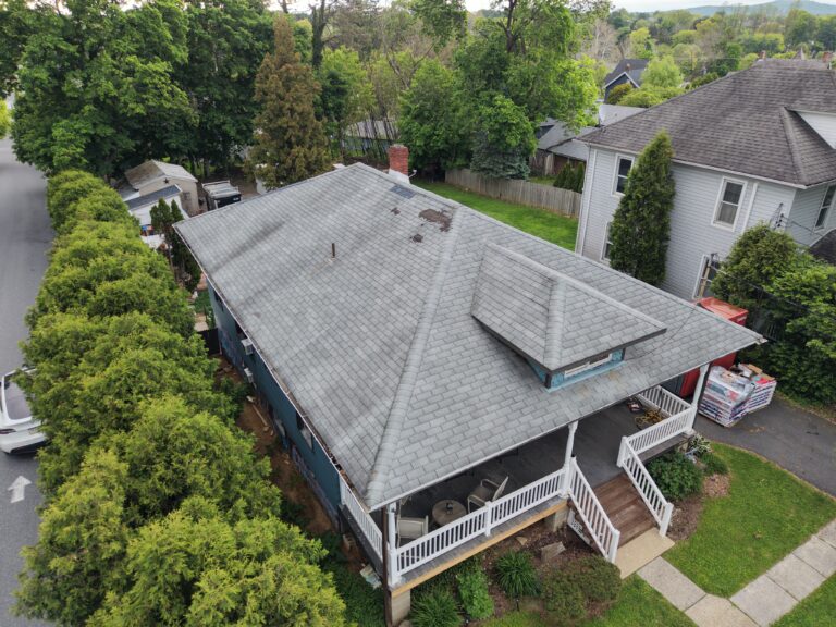 Before photo — ranch home roof replacement in Bethlehem PA on Butztown Rd showing aging three-tab shingles prior to replacement by Roofera