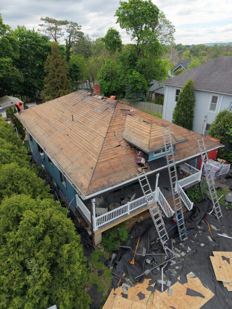 Roof tear-off during ranch home roof replacement in Bethlehem PA on Butztown Rd by Roofera