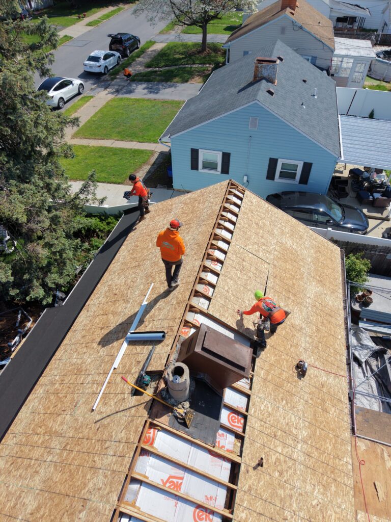 Roof replacement in progress in Bethlehem PA during shingle installation