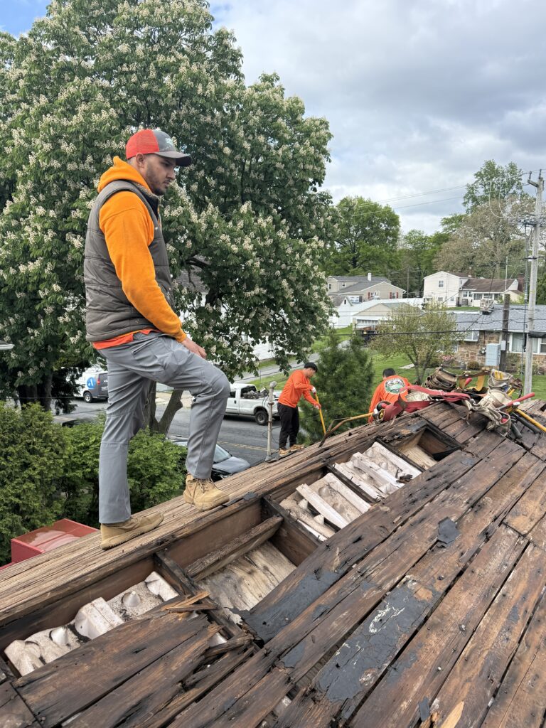 Project manager overseeing ranch home roof replacement in Bethlehem PA on Butztown Rd by Roofera