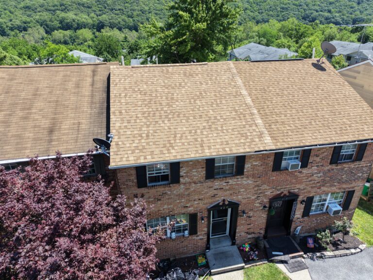 After photo — townhouse roof replacement in Allentown PA on E Mosser St with new GAF Timberline HDZ Shakewood shingles installed by Roofera