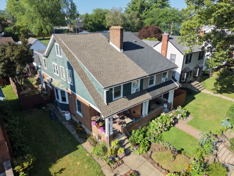 After photo — half twin roof replacement in Bethlehem PA on West Union Blvd with new GAF Timberline HDZ Weathered Wood shingles by Roofera
