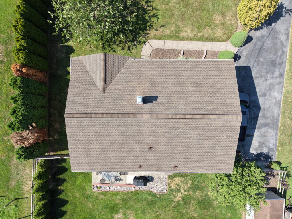 Close-up view of newly installed asphalt shingle roof after installation