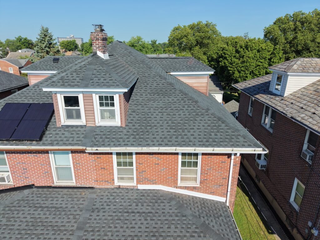 After photo — completed twin home roof replacement in Bethlehem PA on Linden St with GAF Timberline HDZ Charcoal shingles by Roofera